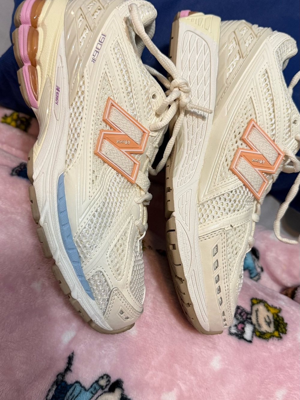 New Balance Women’s Cream Mesh Athletic Sneakers with Pink and Blue Accents